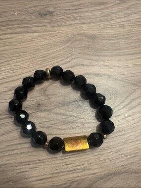 Black Faceted Bead Stretch Bracelet with Gold Accent Bar